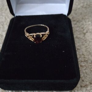 Gold Ring with Deep Red Garnet Stone